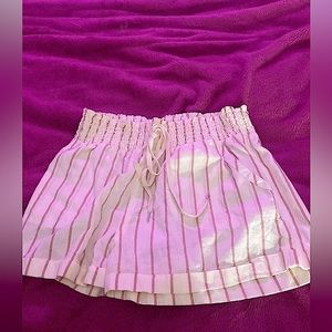 New shorts with tags: size small with strips very cute never worn!!